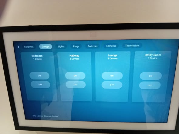 Wall-mounted smart-home interface controlling lights, plugs, switches, cameras and thermostats