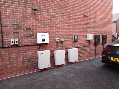 SolaX inverter with three battery storage units and EV charger