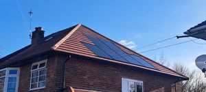 Flush modern panels against a modern tile roof in Manchester