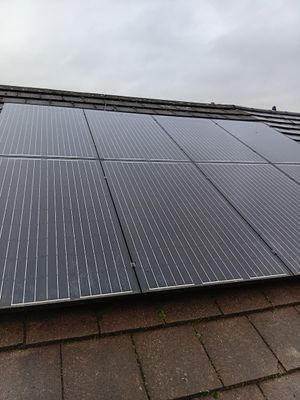 Solar panels on a Manchester slate roof