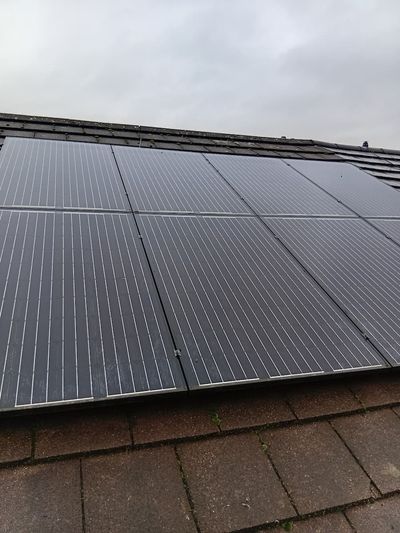 Solar panels on a Manchester slate roof