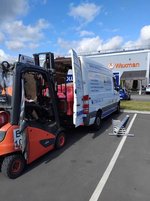 Renegade Solar delivery van with forklift loading equipment at Failsworth