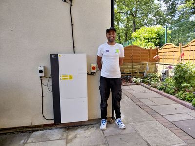 Ashley standing with completed battery storage installation in Barnsley