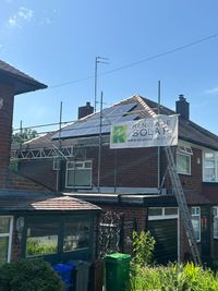 Solar panels on a tiled residential roof during an installation by Manchester installer Renegade Solar